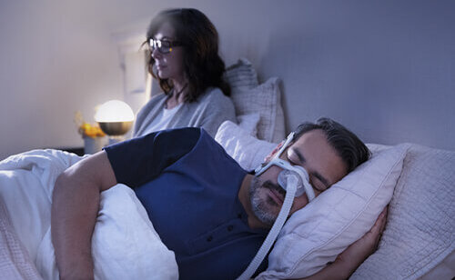 sleep-apnoea-patient-sleeping-with-AirTouch-N20-nasal-CPAP-mask-mobile