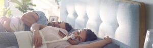 woman-sleeping-with-airfit-p10-for-airmini-cpap-mask-resmed